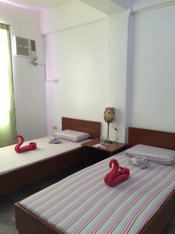 Brielles Travellers Inn Тагбиларан Экстерьер фото